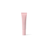 Pink skincare tube on a white background